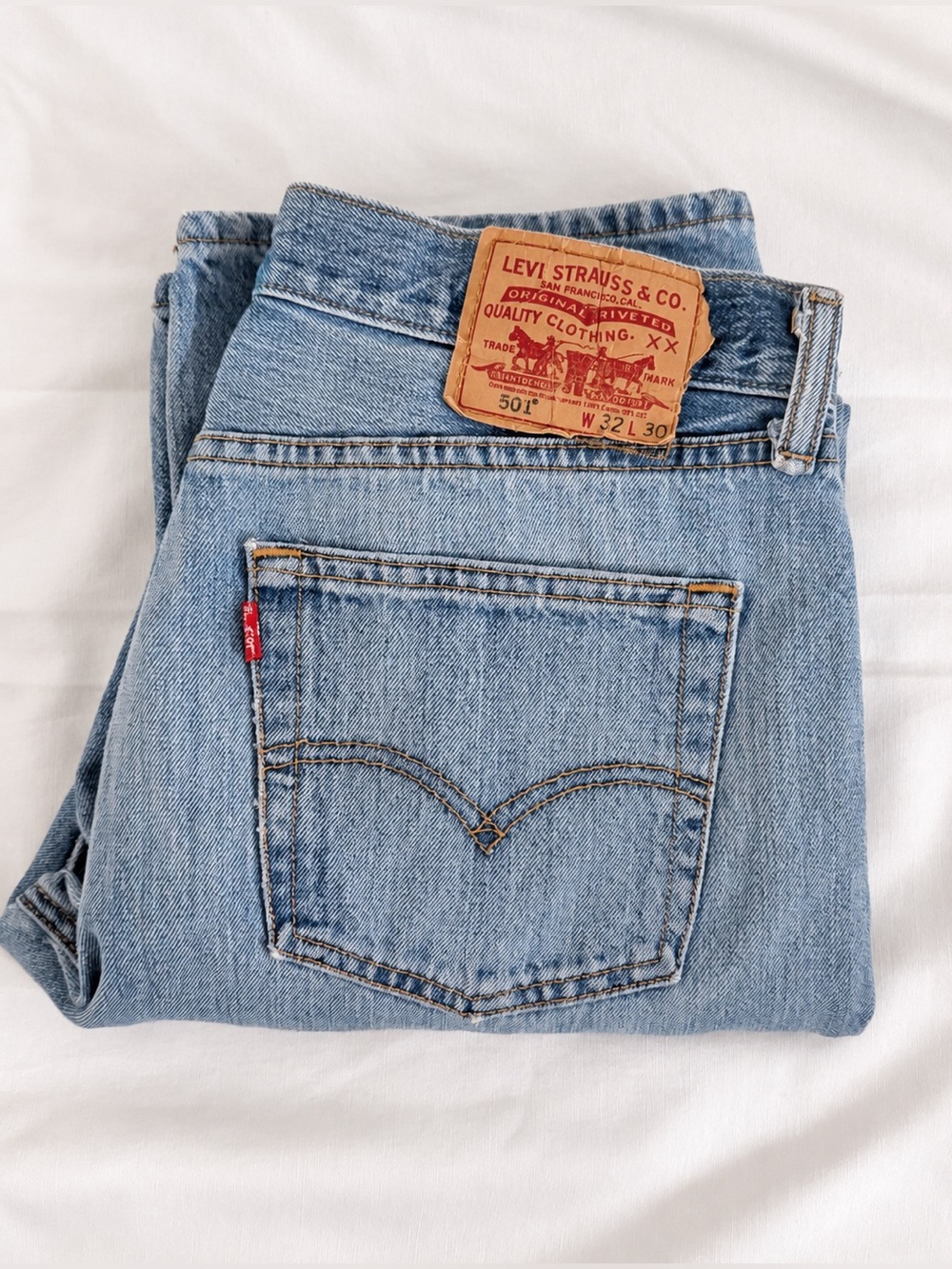 Early 2010s Levi’s 501s with a naturally faded, vintage-style wash